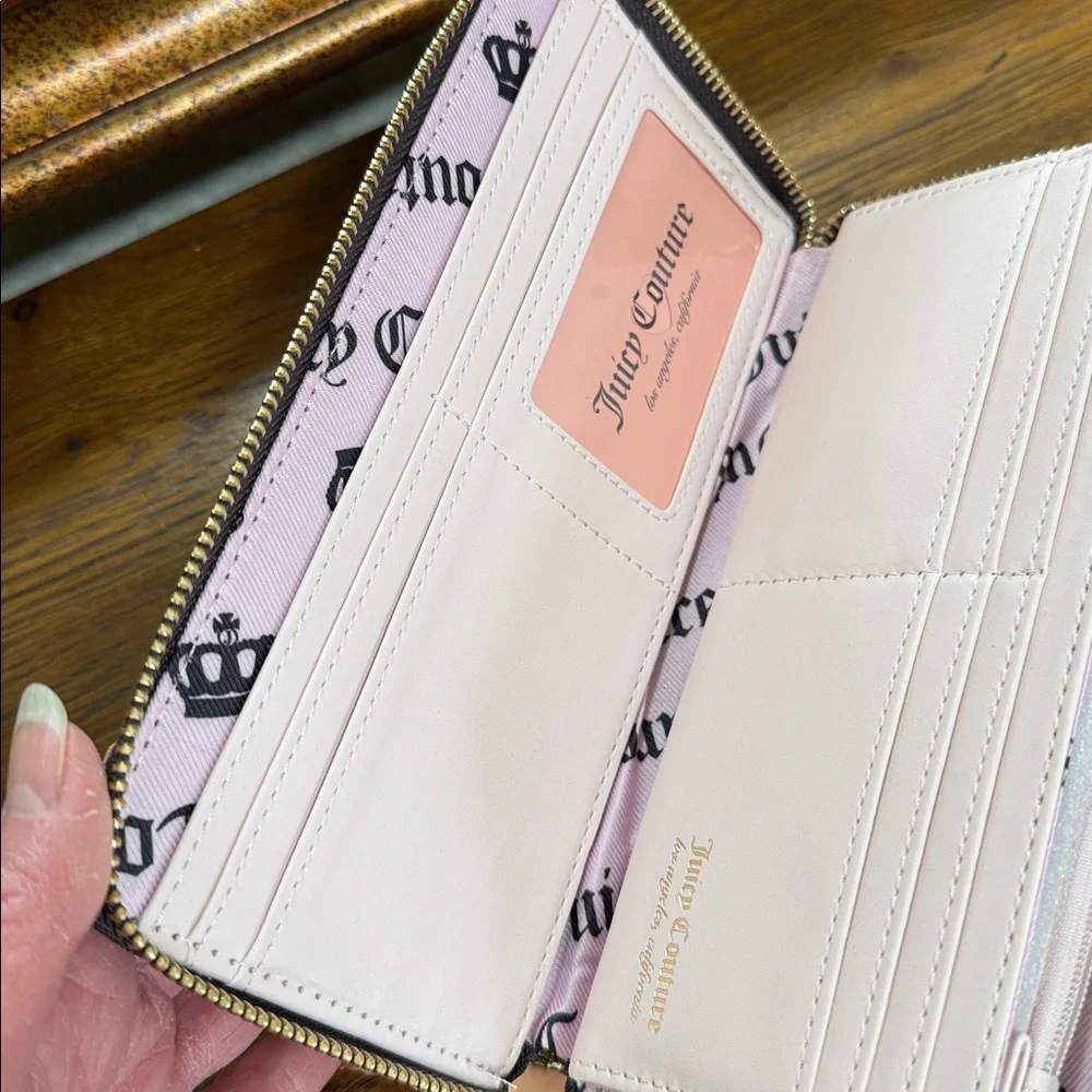 Juicy Couture Love & Crown Logo Wristlet. Zip around. Brown and tan color.